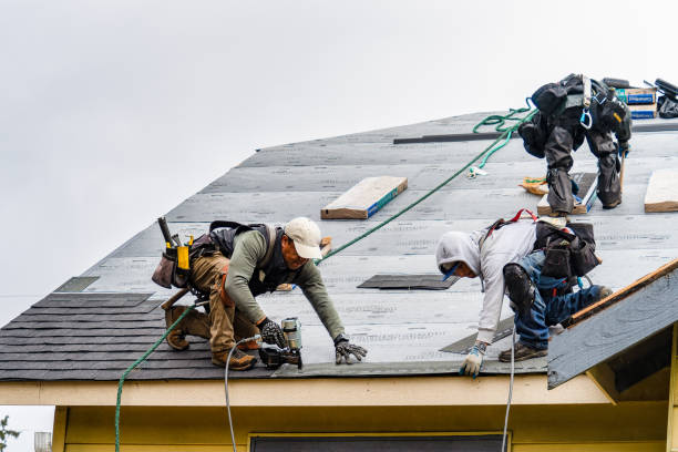 Professional Gutter Installation technician working in Fort George G Meade, MD